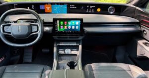 The inside of a car showing an upgraded control unit system