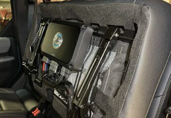 A car audio amplifier instillation in progress