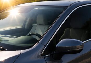 A car without window tint in the sun